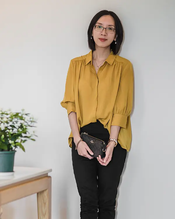 InnoSelect founder Wendy in a warm, creative studio environment, representing the blend of 18 years of industrial expertise and modern aesthetic vision.