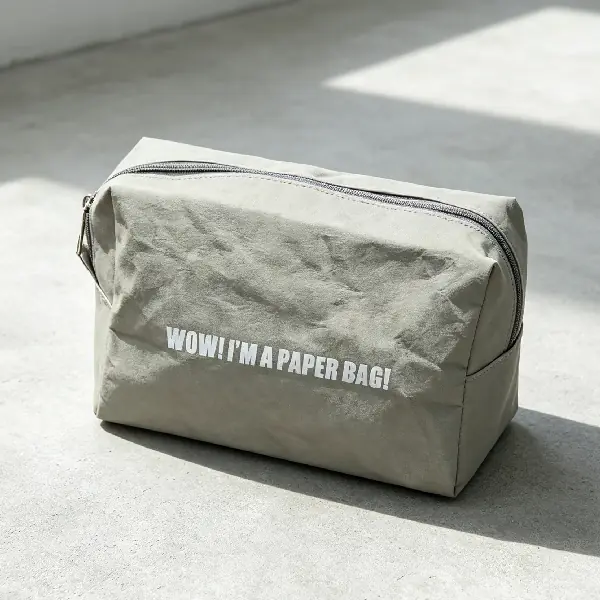 Washable paper tech organizing pouch with zipper closure for customizable tech employee onboarding kits.