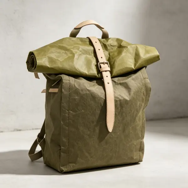 Olive green washable kraft paper roll-top backpack with leather accent strap