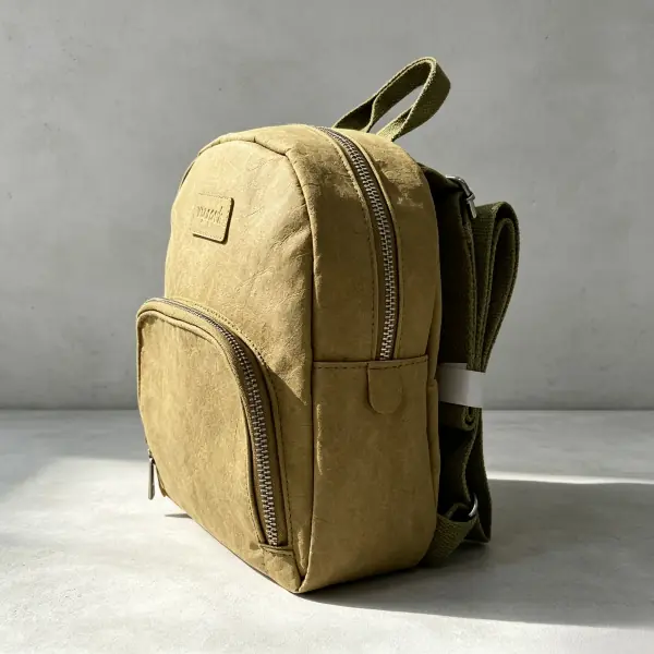 Khaki washable paper backpack with front utility pocket for daily use