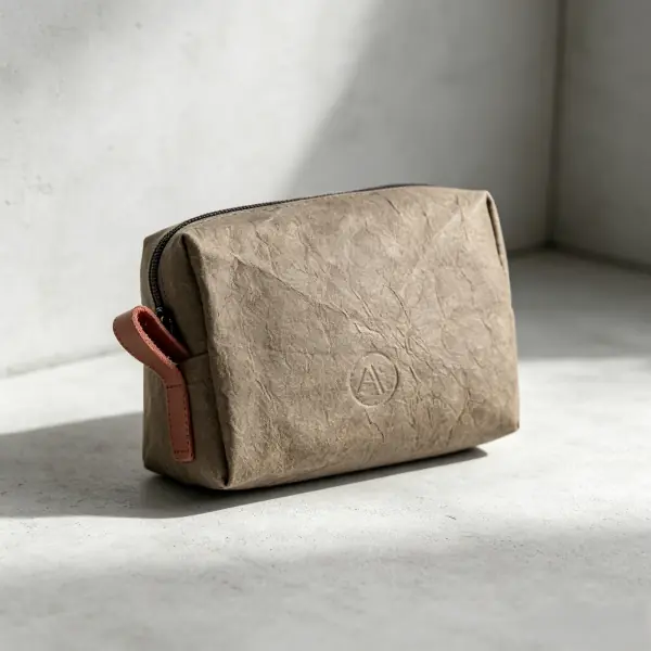 Grey washable kraft paper travel pouch and compact cosmetic washbag